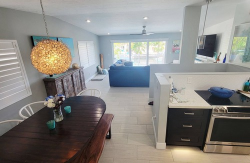 Tavernier House | Coconut Hut Oasis - 3 Bedroom Waterfront home with Pool/Spa, Tiki Hut, and Dock