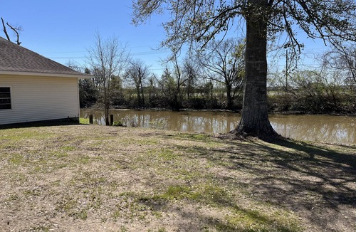 Bourg House | COZY BAYOU - Spacious Home on Bayou Petit Caillou. SLEEPS 14