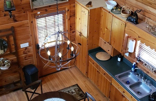 Arley Cabin | Cute, cozy log cabin on beautiful Smith Lake, Arley AL (year round deep water)