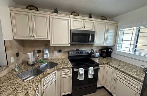 Crescent Beach Condo | Direct Oceanfront Premium Flat with 2 Bed/2 Bath +Murphy Bed. New Everything