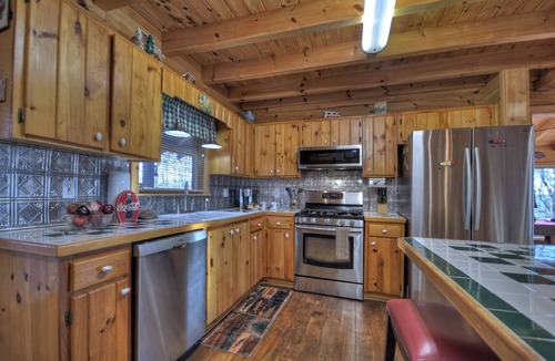 Ellijay Cabin | Discover Treetop Getaway -Pet-friendly retreat with panoramic mountain views, hot tub, firepit, fenced yard, WiFi, and a game-room