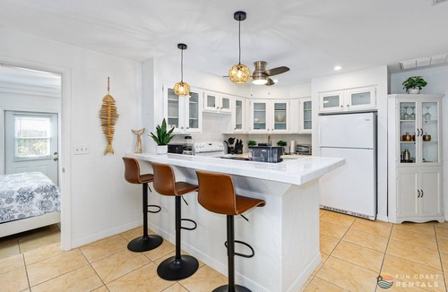 New Smyrna Beach House | Dog Friendly Home with Private Yard, Office & Fire Pit! STEPS to the Beach!