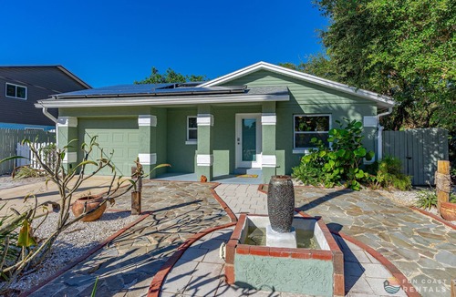 New Smyrna Beach House | Dog Friendly Home with Private Yard, Office & Fire Pit! STEPS to the Beach!
