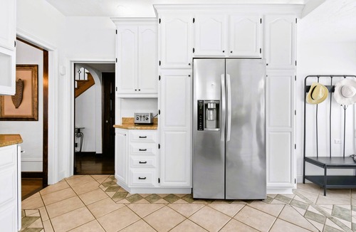Lake Park House | Elegant 1926 Mediterranean Villa Heated Pool/Spa Sleeps 8