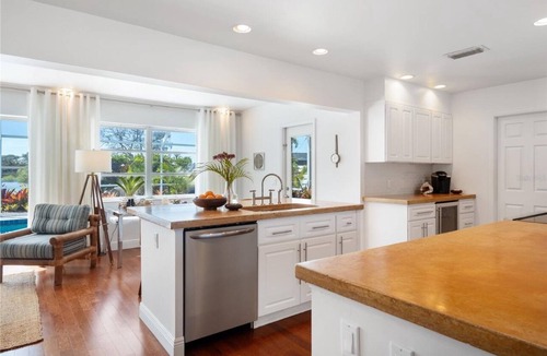 Englewood House | Escape to Paradise at Coconut Palms: Your 2 bed 2 bath Tropical Retreat Awaits!