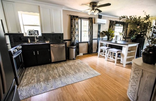 Cave Spring House | Escape to Tranquil Waters, where comfort meets calm. Enjoy serene river views and waterfront access, inviting spaces, and the perfect backdrop for rest, romance, or family fun. Boat Rental and Fishing Charters available anytime of the year.