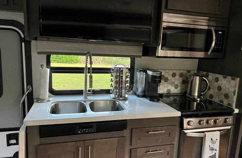 Parkland House | "Experience Enchantment: Book Your Dream Stay at The Magic Motor Home Today!"