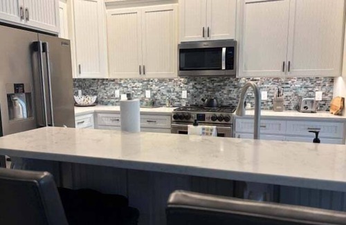 St. Simons Island House | Golf course-view home near beaches with deck, porch, grill, streaming, W/D, & AC