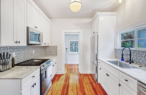 Parrot Cove House | Gorgeous Paradise House with Three Studios Attached!