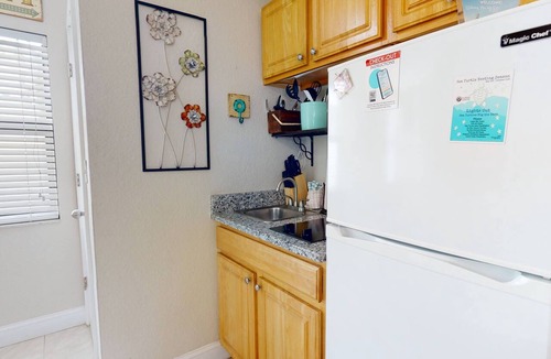 Redington Beach Condo | Great Value! Steps to Beach - Large Patio Area ~ Heated Pool ~ Free Parking - Ground Floor Condo