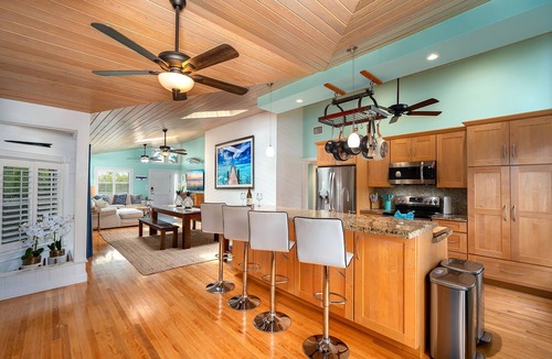 Sugarloaf Shores House | Green Turtle Oasis: 4BR Canal Front Home, Pool, Dockage, Outdoor Dining & Pets