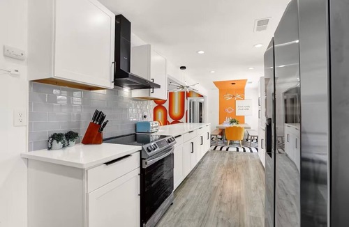 University District House | Groovy Getaway: Hot Tub, Firepit, Games & Chill Vibes