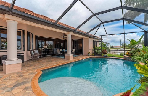 Burnt Store House | Gulf Access Sleeps 8 - Villa Tropicana - Roelens Vacations