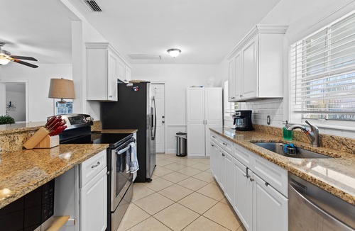 Palm Beach Shores House | Heated Saltwater POOL + Walk to the Beach + Chair/Umbrella Pass Included