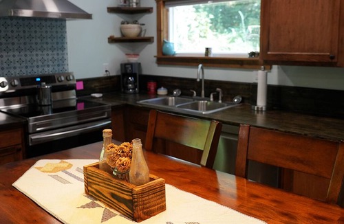 Lupton City Cabin | Hidden Cove Cabin at The Pines: Hand Crafted Charm in Peaceful Wooded Cove