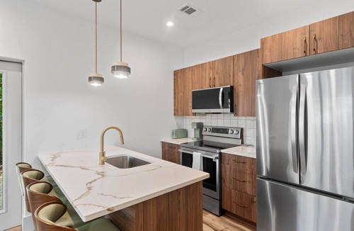 East Side House | Hot Tub · Outdoor TV & Fireplace · Rooftop Terrace