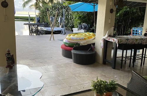 Key Largo House | House and guest house with Boat dock, sunsets, jacuzzi, pool, slide, tiki, etc