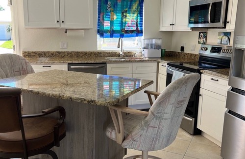 Saint James City House | Immaculate Waterfront Home With Heated Pool. Pet Friendly.