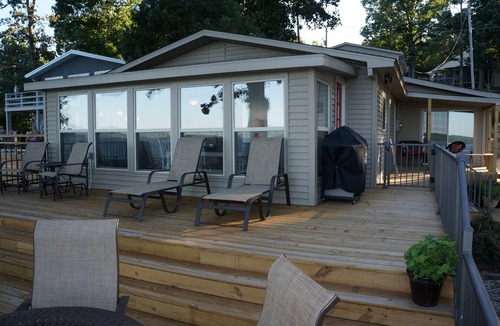 Gilbertsville House | Incredible sunrises await you as you drink coffee and overlook the main lake.