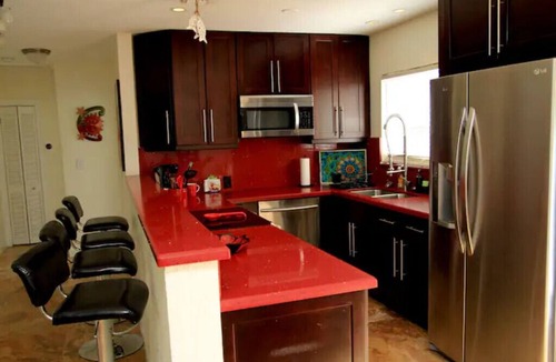 Middle River Terrace House | It’s always Summer here! Tropical vibes with heated pool, pets welcome!