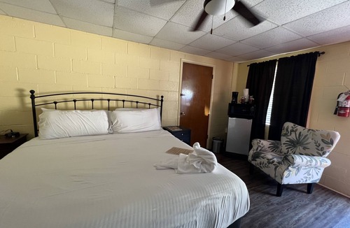 Mount Ida Hotel | JI4, King Guest Room at the Joplin Inn at entrance to the resort by RedAwning