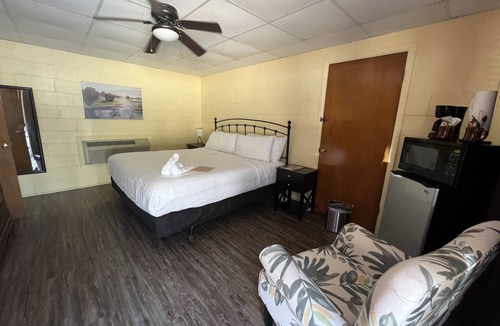 Mount Ida Hotel | JI4, King Guest Room at the Joplin Inn at entrance to the resort by RedAwning