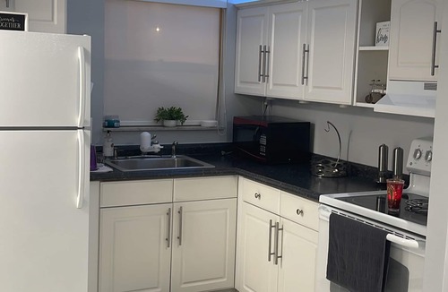 Sunrise Apartment | Kick back and relax in this calm, stylish space apartment with 1 bed 1 bath.