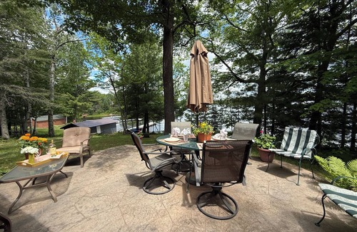Hayward House | Lake Chippewa Flowage - Secluded patio, private home & dock, A/C, washer, dryer
