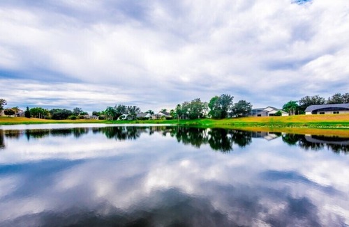 Sunridge Woods Villa | Lake View From Pool 4 Bed 3 Bath- Perfect for Snowbirds!