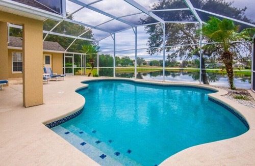 Sunridge Woods Villa | Lake View From Pool 4 Bed 3 Bath- Perfect for Snowbirds!