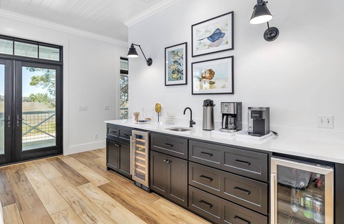 East Beach House | Large marsh front home with private pool and short walk to beach.