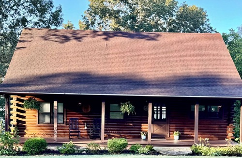 Livingston County Cabin | Log cabin with walkout basement and loft located on Ohio River’s edge.