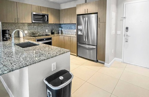 Doral Apartment | Luxe 2BR Suite w/Partial Golf View | Pool & Sauna