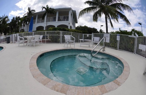 Islamorada Condo | Luxury 3 bedroom condo overlooking harbor with ocean view, boat slip, amenities