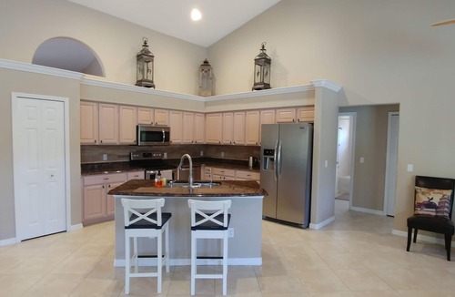 North Port House | Luxury fully private villa with a heated pool in North Port. (14 guests)