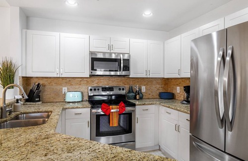 Pelican Condo | Luxury Ground Floor Condo - Pool - Fitness Center