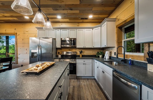 Gatlinburg - Pigeon Forge Cabin | Luxury Mountain Getaway + Stunning Views + Expansive Decks + Heated Indoor Pool