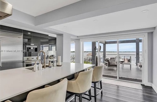 Buccaneer Point Ski Chalet | Luxury Oceanfront Mansion With Sea Access, Including a Private Boat and Jet Ski.