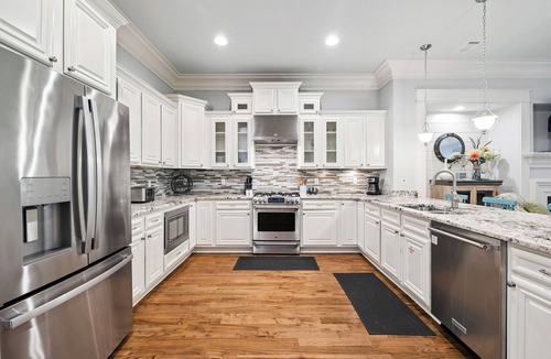 WaterSound West Beach House | Luxury retreat with screened porch, BBQ, pond view, firepit, pool & beach access