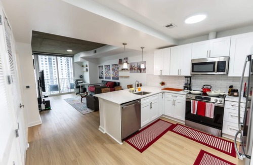 North Decatur Apartment | Midtown Atlanta 1BR Skyline Balcony Corner Condo by Piedmont Park Luxe Pad