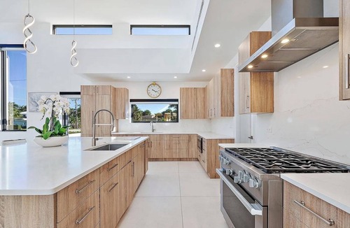 College Park House | Modern Luxe Lake Worth Beach Oasis w/Rooftop Terrace, Heated Pool+Spa, Gym Space