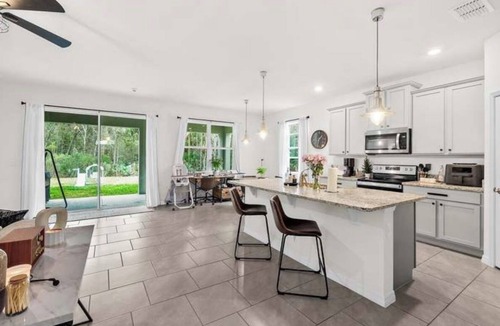 New Smyrna Beach House | Modern Luxury w/included activities on Nature Preserve by Beach. Pet friendly!