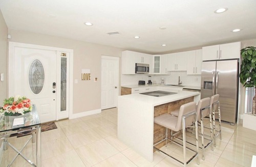 Lake Worth Corridor House | Modern Palm Springs Getaway Private Heated Pool