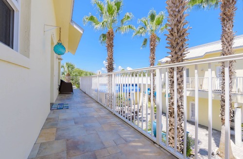 New Smyrna Beach Condo | *New Listing* Luxury Courtyard Condo! Walk to Beach/Restaurants/Shops. Free WiFi