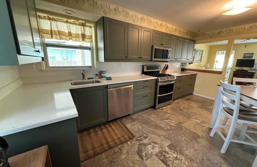 Boardwalk House | Newly remodeled beach cottage - one block from Flagler Ave & 2 blocks from beach