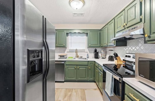 Brighton House | Newly Renovated "Home Away From Home" A spacious, modernized 4-bedroom home.