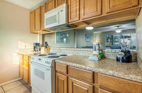 Sugar Beach House | Oceanfront townhouse near beach with pool, balcony, central AC, & washer/dryer