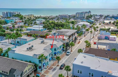 New Smyrna Beach Apartment | ON Flagler Avenue! Dog Friendly with Balcony and Parking Walk to the Beach!