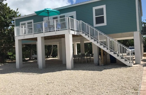 Cudjoe Key House | PARADISE 3 MINUTES TO OPEN WATER-60FT DOCK-WIDE CANAL RESERVE AREA-CUDJOE KEY