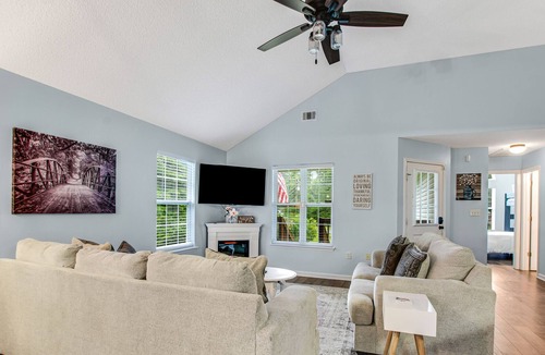 Midway House | Peaceful lake escape with water views, outdoor games, firepit, & on-site fishing